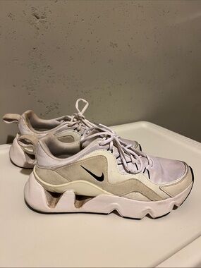 Nike Women’s Cream and White Athletic Sneakers with Black Swoosh